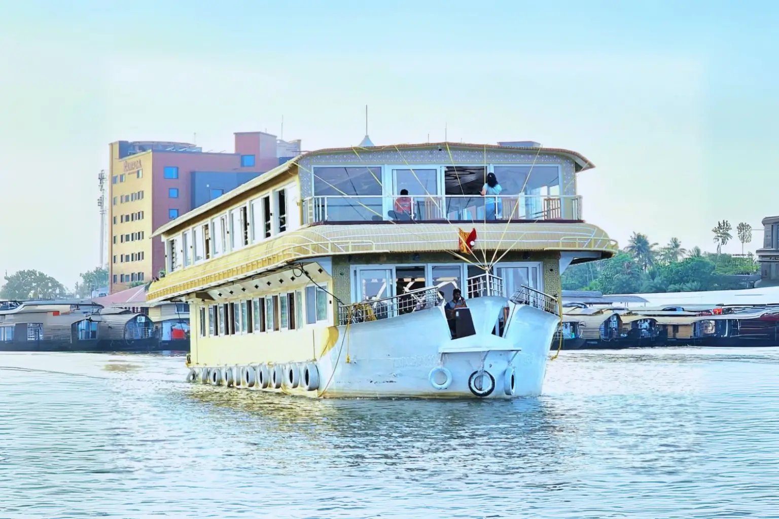 Alappuzha Airavatham ultra luxury 8 bedroom white double-deck houseboat cruising near Alleppey