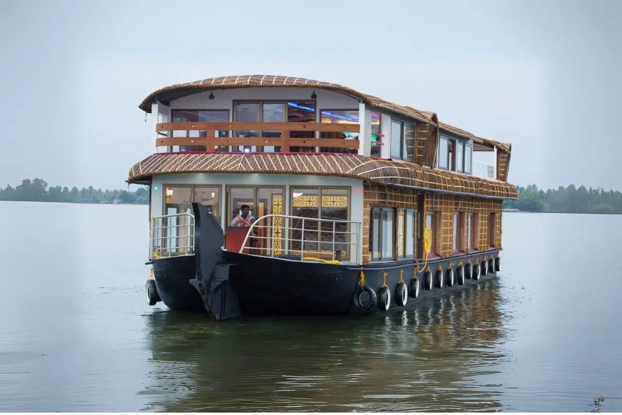 Thayankary Tharavad premium 6 bedroom double-deck houseboat on calm water